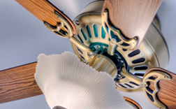 Wooden ceiling fan on a white ceiling