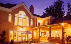 Exterior of a house at night lit up
